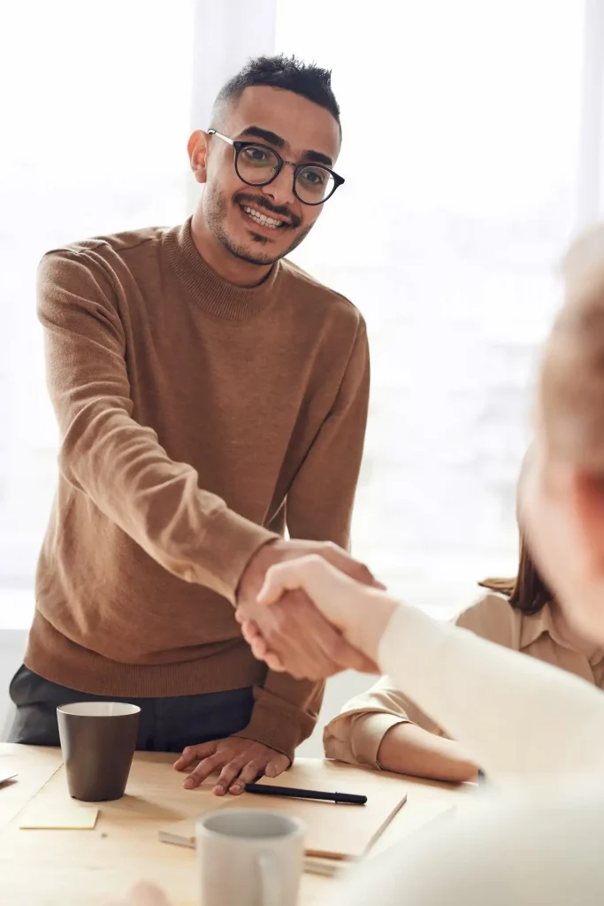Man shaking hands after taking a legit loan from a money lender singapore