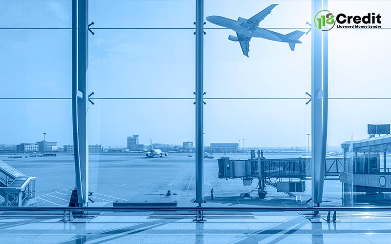 Airplane taking off from airport, representing air miles.