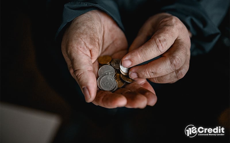 A person collecting money at a funeral